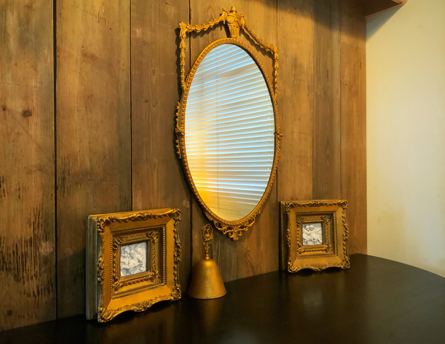 Italian gilt plaster framed plaques
