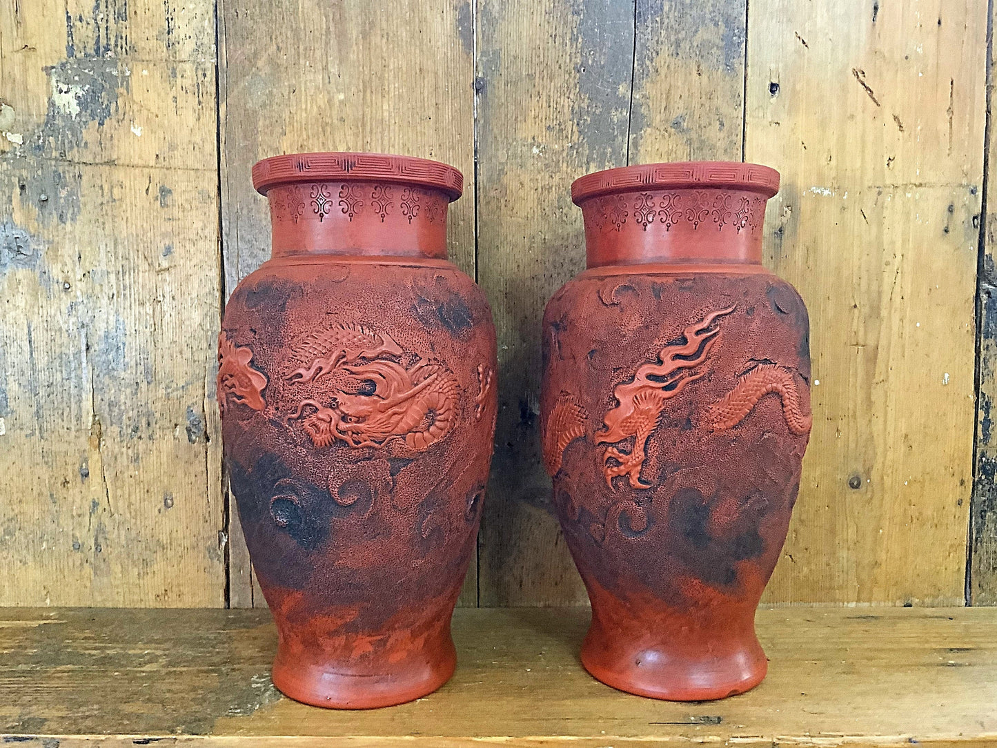 An attractive pair of Chinese dragon vases