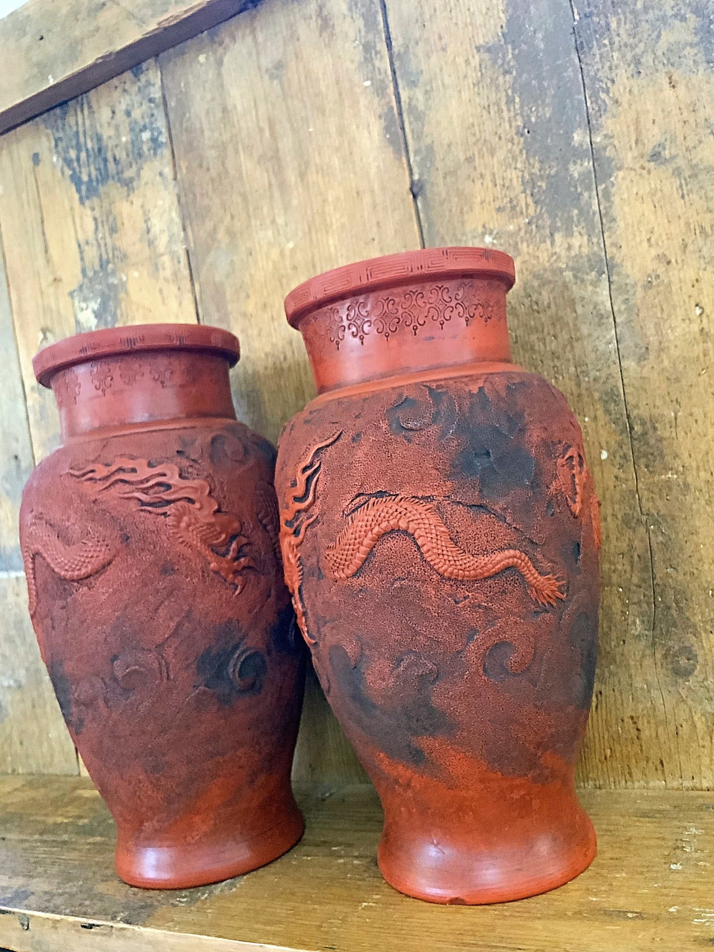 An attractive pair of Chinese dragon vases