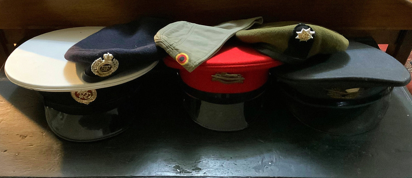 An assortment of military head wear