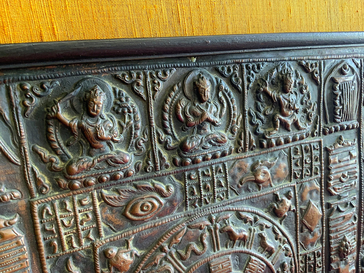 A stunning and framed Tibetan calendar