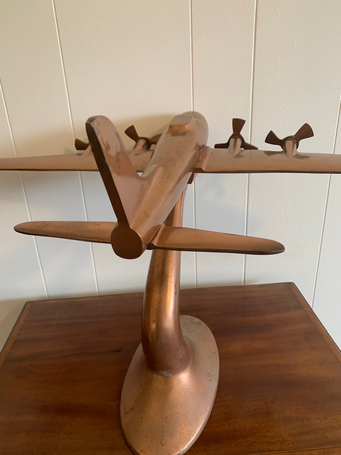 A metal Copper plane ornament