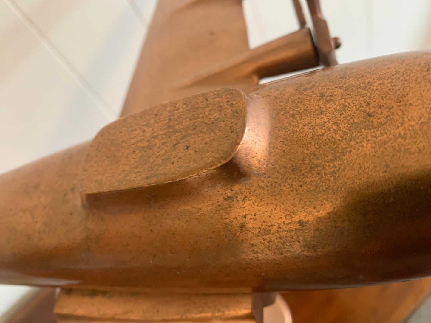 A metal Copper plane ornament