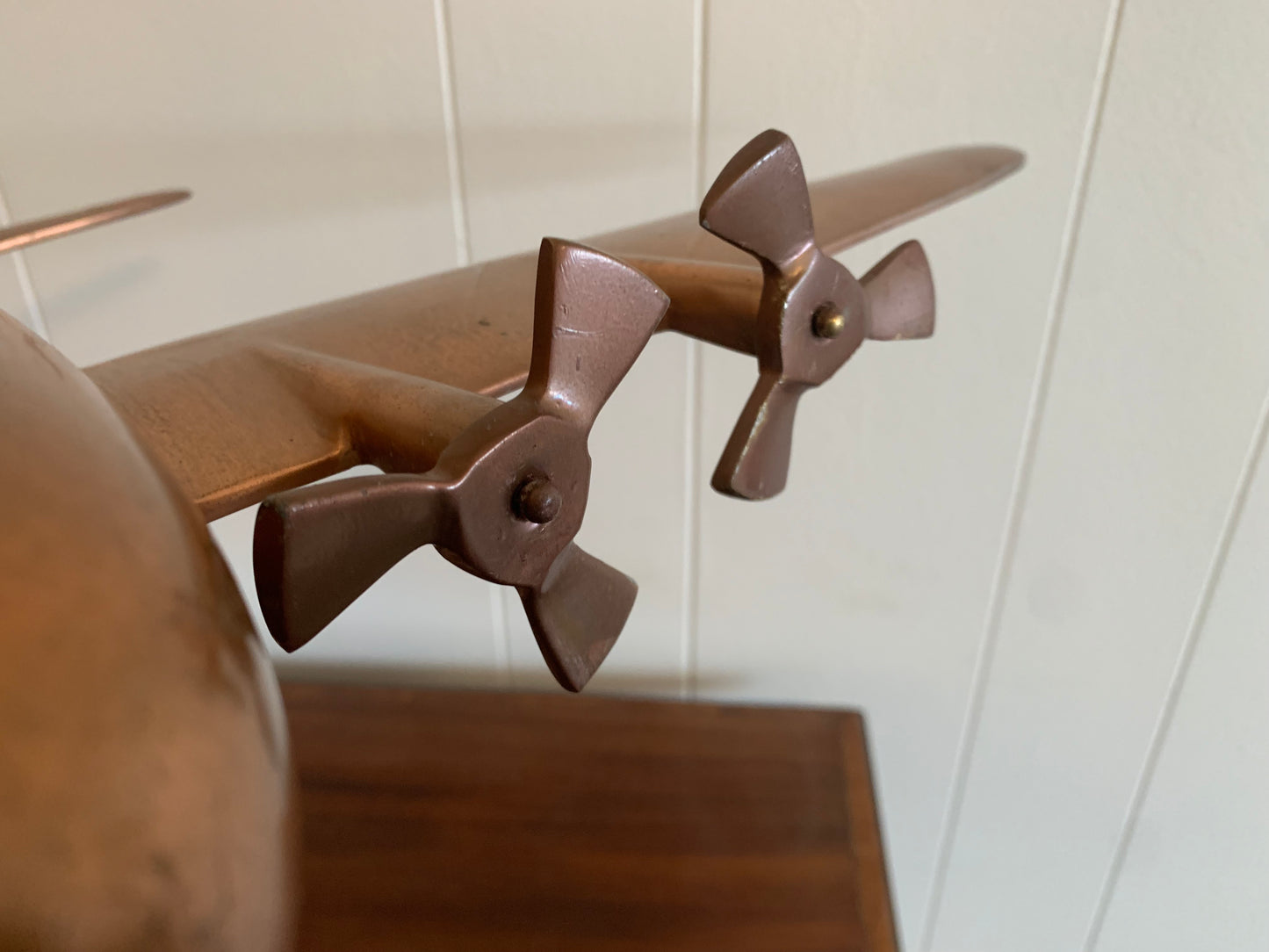 A metal Copper plane ornament
