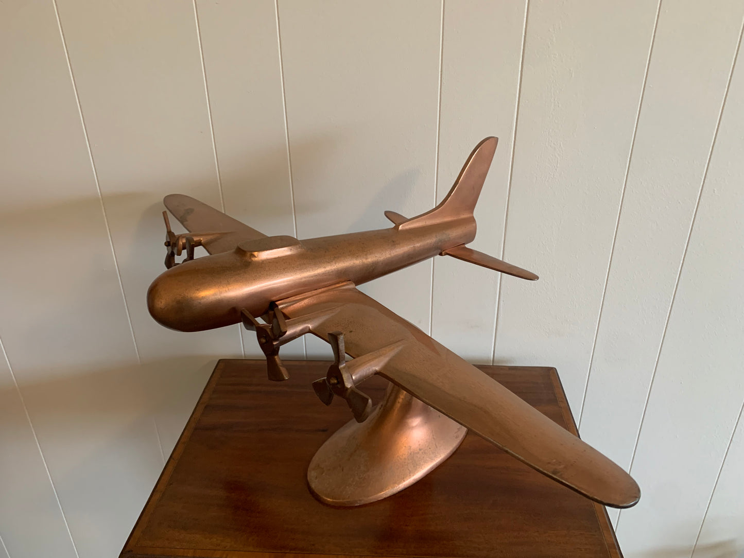 A metal Copper plane ornament