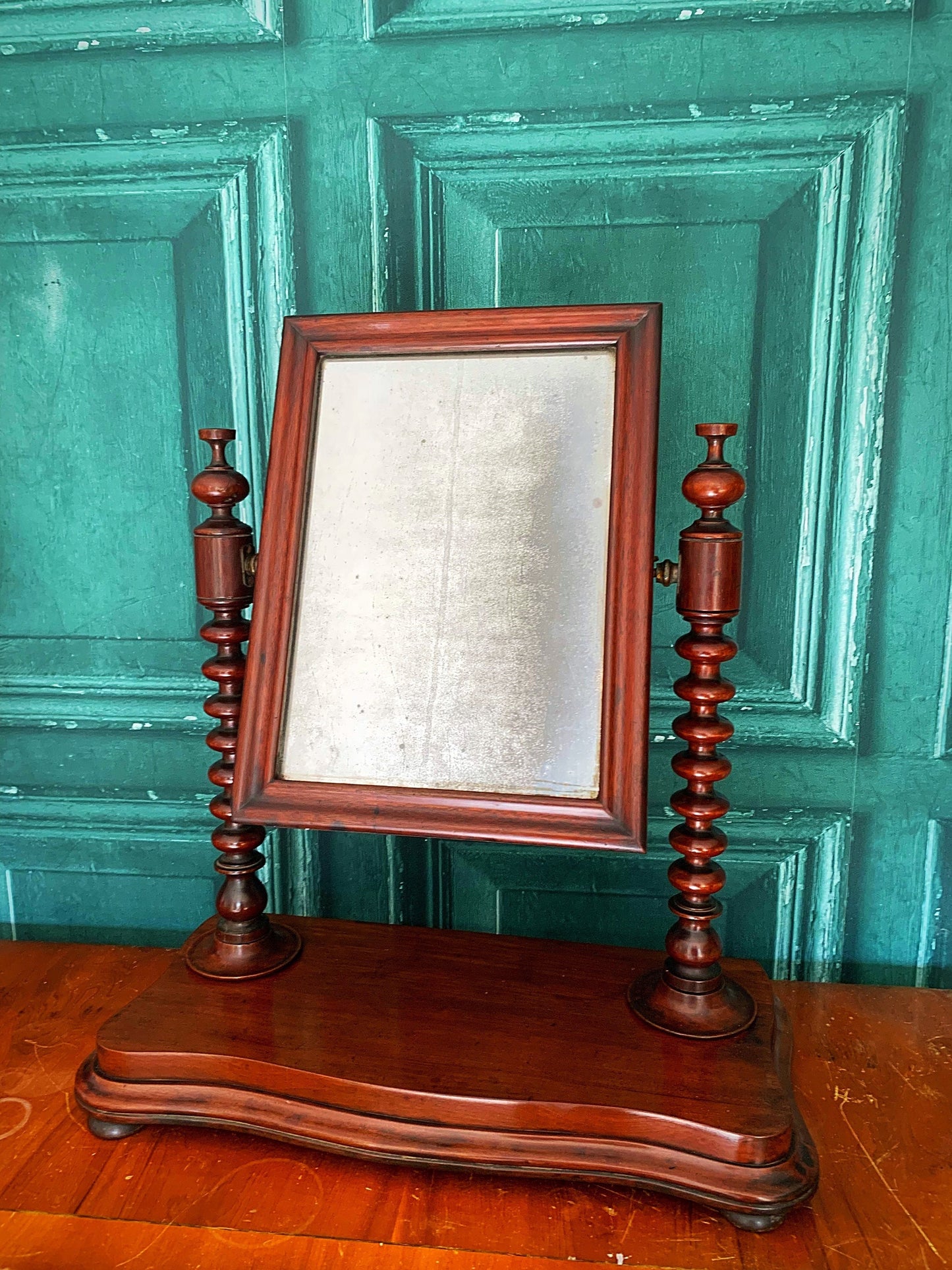 A beautiful English antique bobble mirror