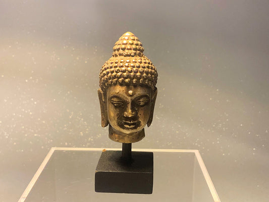 An outstanding Buddha   bust or mounted head