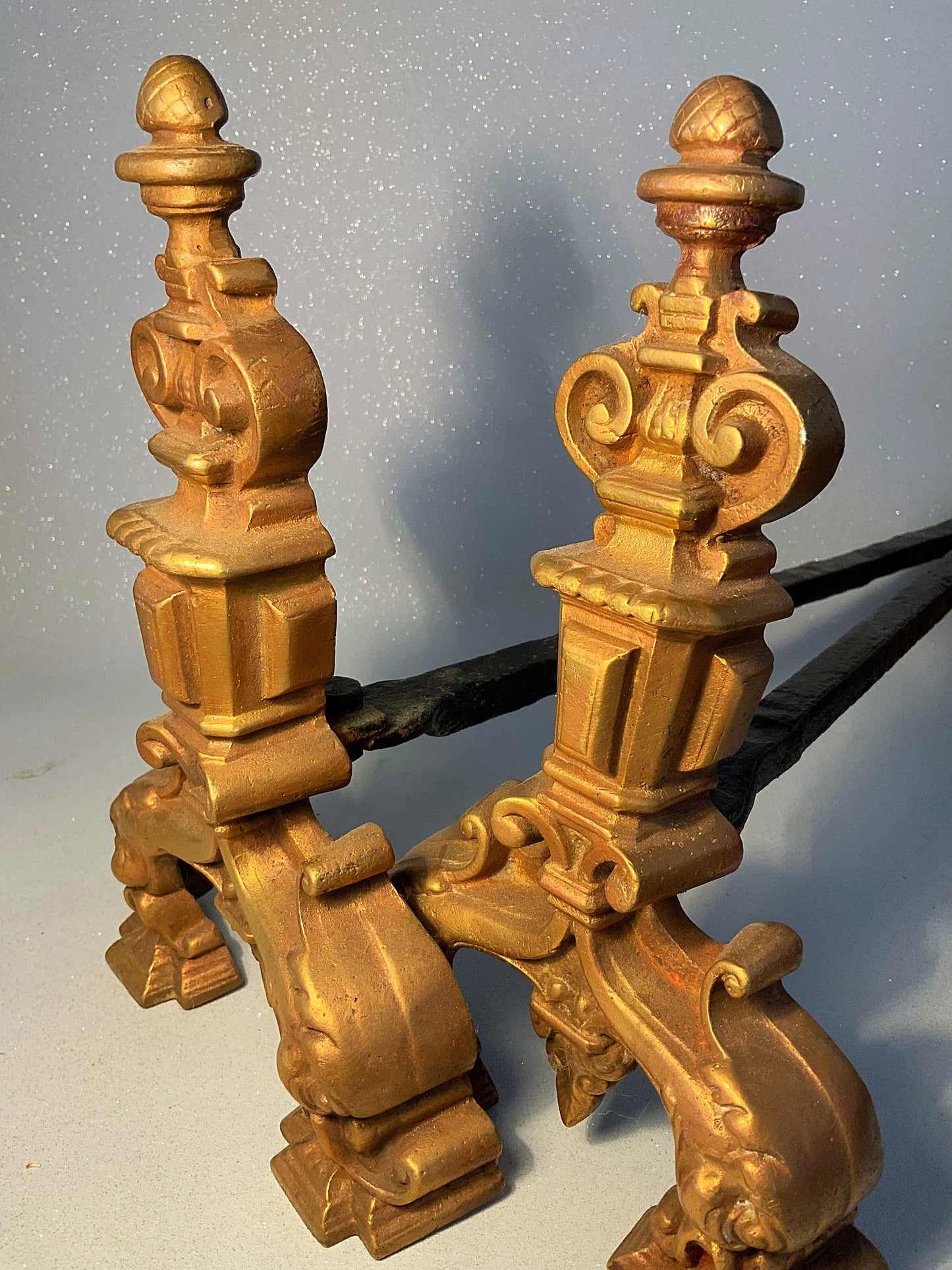 A super set of antique cast iron fire dogs or guards