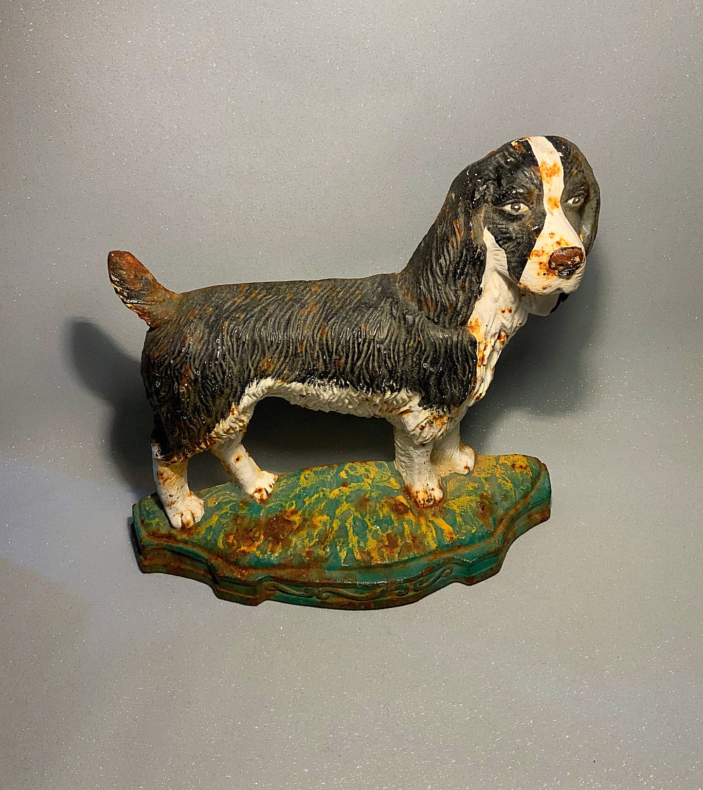 A super antique dog door stop