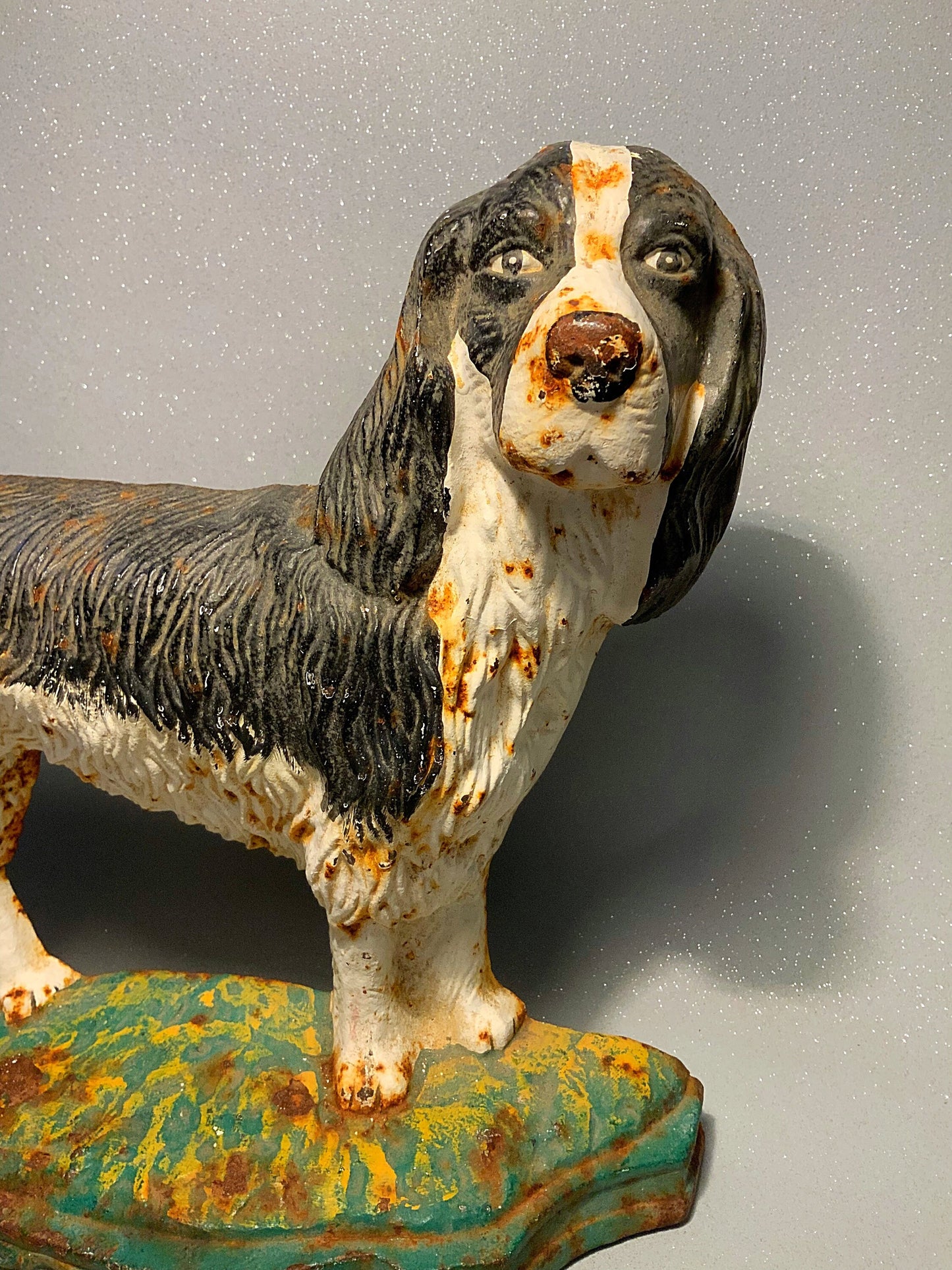 A super antique dog door stop