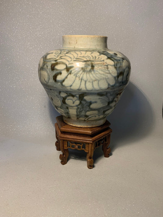 An antique Chinese porcelain yuan dynasty vase or pot