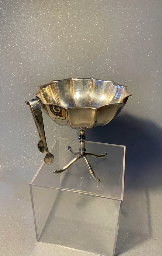 A beautiful raised silver plated sugar bowl & tongs