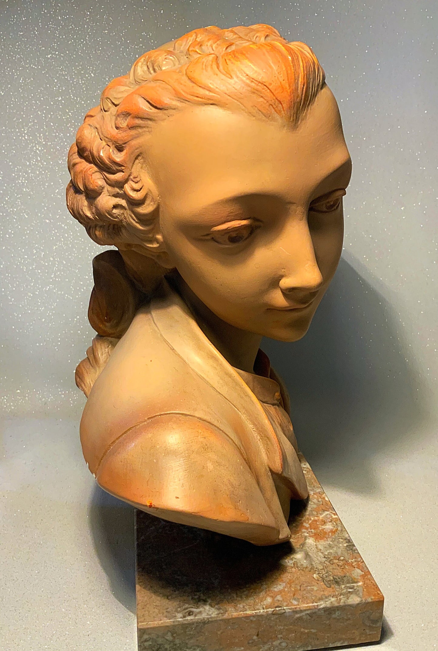 A very good French plater bust mounted on marble