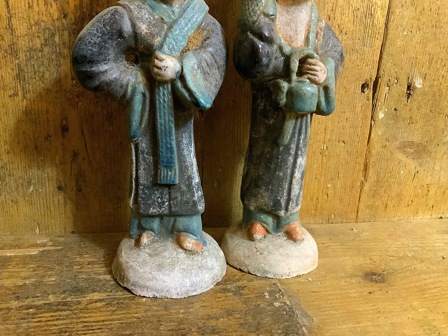 A stunning and large  pair of antique Chinese Attendants,