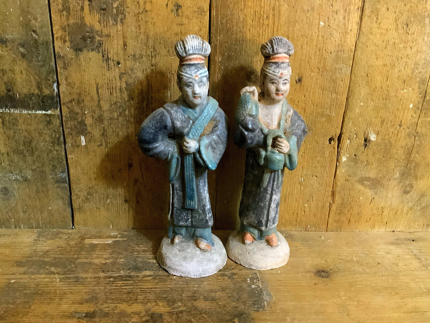 A stunning and large  pair of antique Chinese Attendants,