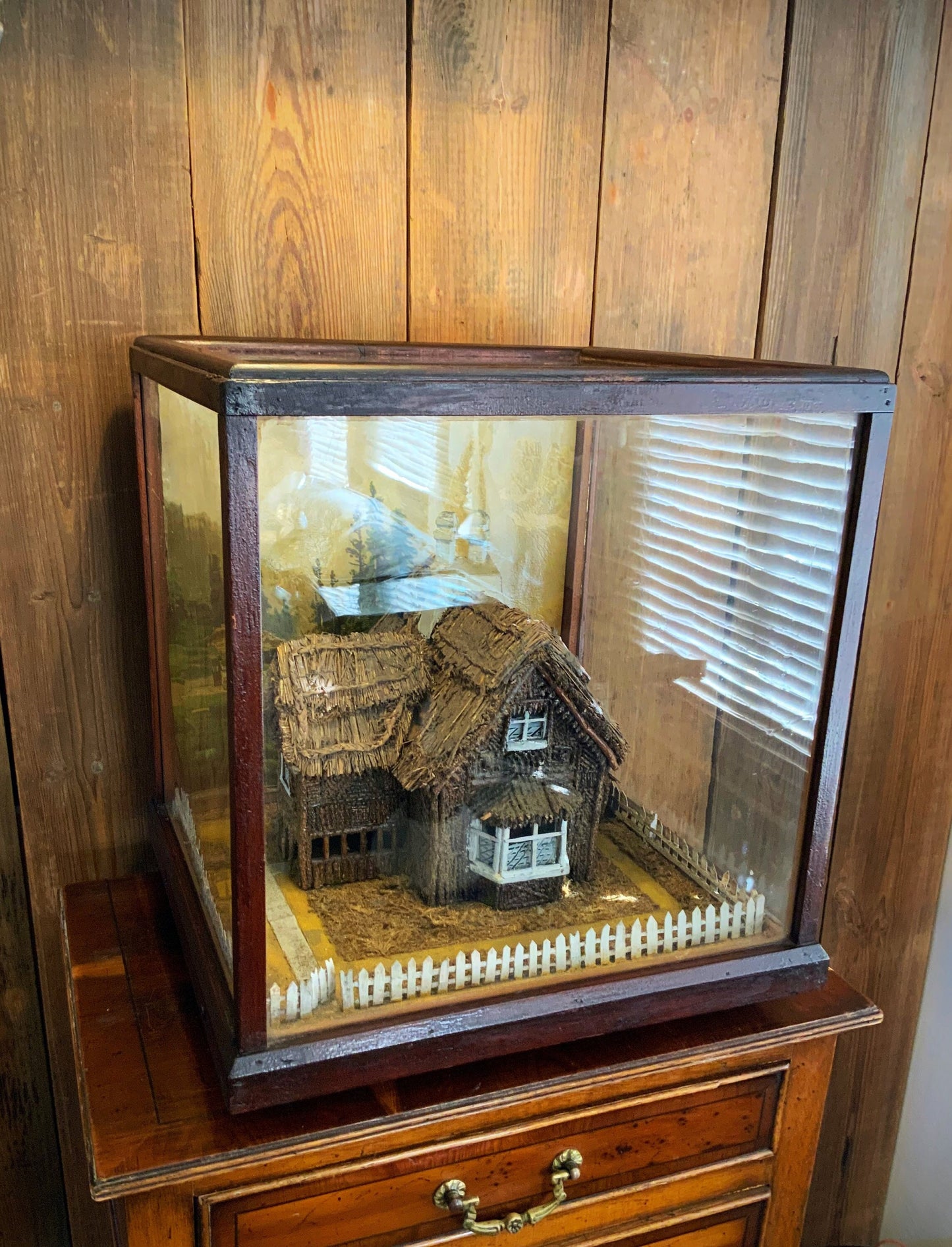 A diorama or scale model of a period country house