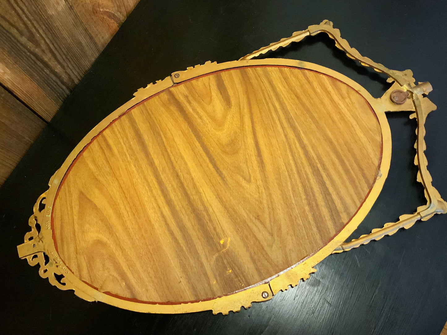 An English gilt and iron regency style mirror