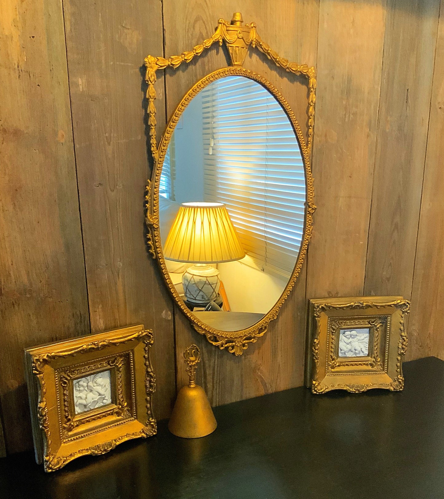 An English gilt and iron regency style mirror